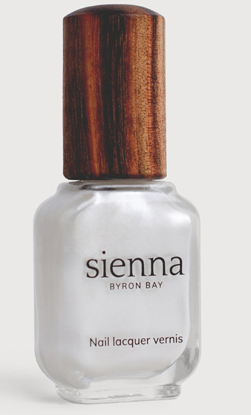 Sienna Aura pearlescent white nail polish bottle with timber cap