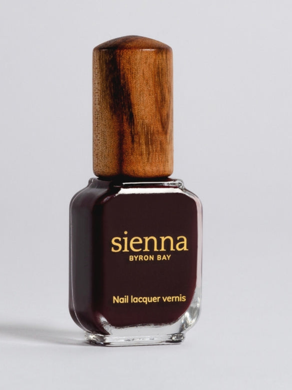 Sienna Florence deep burgundy nail polish bottle with timber cap